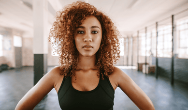 african fitness woman at gym